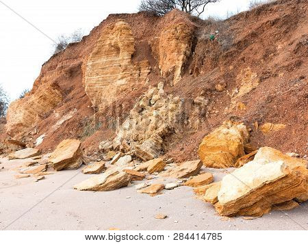Rockslide. Mountain Landslide In An Environmentally Hazardous Area. Large Cracks In Earth, Descent O