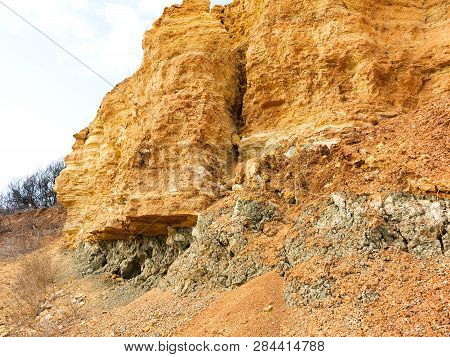 Rockslide. Mountain Landslide In An Environmentally Hazardous Area. Large Cracks In Earth, Descent O