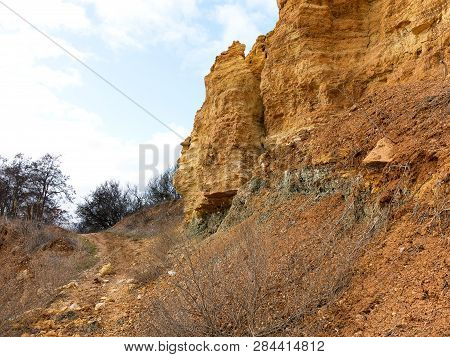 Rockslide. Mountain Landslide In An Environmentally Hazardous Area. Large Cracks In Earth, Descent O