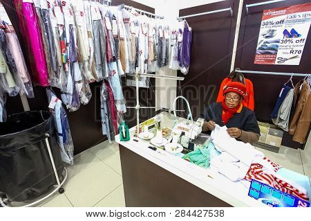 Inside Interior Of A  Dry Cleaners In A Mall