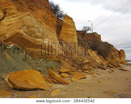 Rockslide. Mountain Landslide In An Environmentally Hazardous Area. Large Cracks In Earth, Descent O