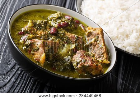 Delicious Spicy Iranian Dish Ghormeh Sabzi Of Lamb Stew Meat With Herbs And Beans Closeup In A Bowl.