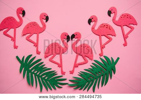 Flamingos And Leaves On A Pink Background. Summer Design.