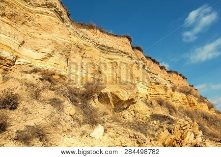 Rockslide. Mountain Landslide In An Environmentally Hazardous Area. Large Cracks In Earth, Descent O