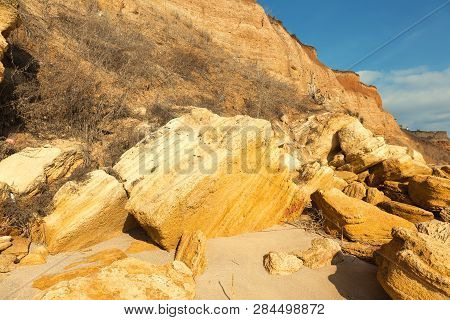 Rockslide. Mountain Landslide In An Environmentally Hazardous Area. Large Cracks In Earth, Descent O