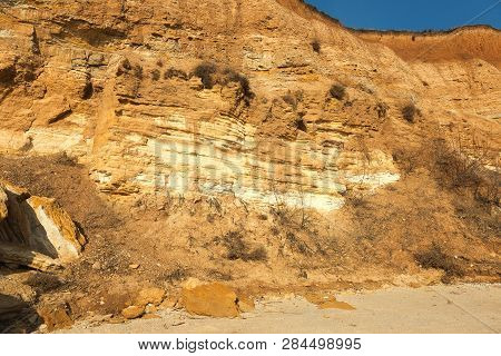 Rockslide. Mountain Landslide In An Environmentally Hazardous Area. Large Cracks In Earth, Descent O