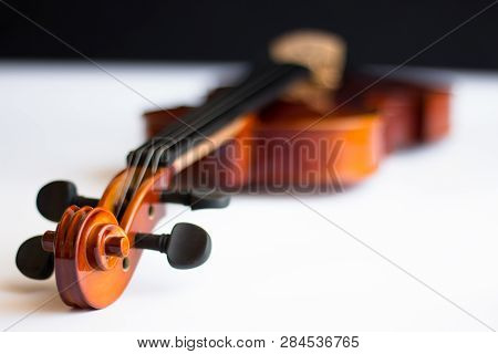 Violin Or Viola With Bow In White Background. Fiddle In White Background