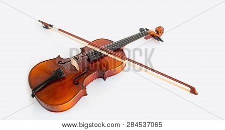 Violin with bow in white background or fiddle in white background