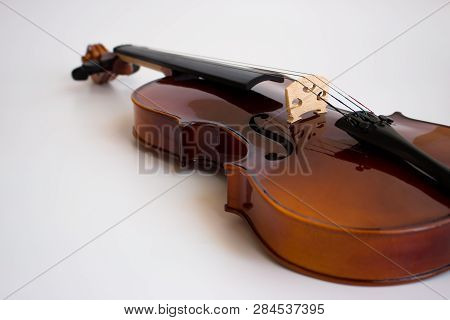 Violin with bow in white background or fiddle in white background