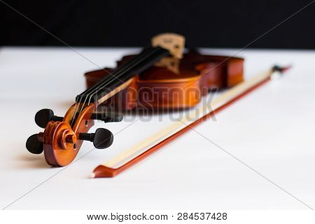 Violin with bow in white background or fiddle in white background