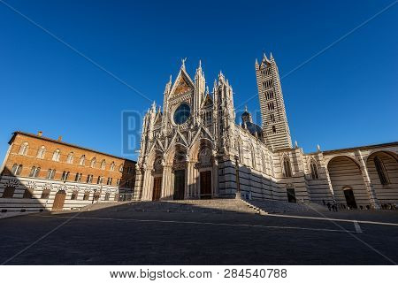 Siena Cathedral, Santa Maria Assunta 1220-1370 With Clear Blue Sky. Tuscany, Italy, Europe