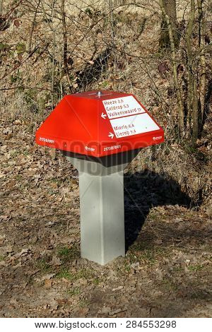 Mierlo, The Netherlands - February 16, 2019: Typical Dutch Signpost By The Side Of A Footpath And Cy