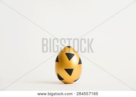 Easter Decorated With Golden Potal Egg  Isolated On White Background. Minimal Easter Concept. Top Vi