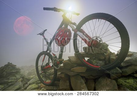 Bike In The Fog At Sunrise