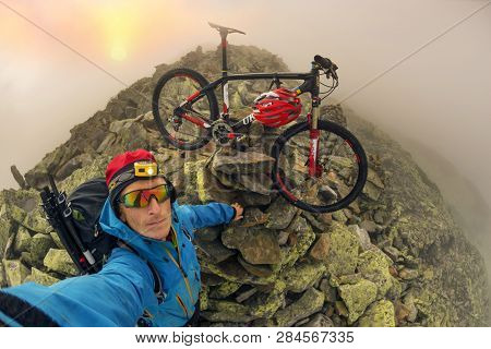 Bike In The Fog At Sunrise