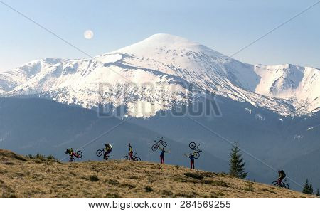 Rider Among  Fantastic Snow Peaks