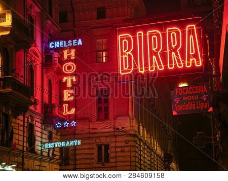Turin, Italy - January 1, 2019. Hotel, Ristorante, Focacceria And Birra Neon Signboard In An Italian
