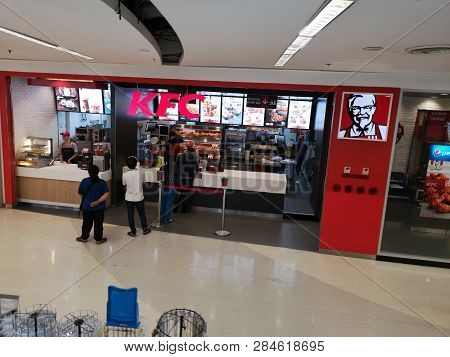 Chiang Rai, Thailand - February 15 : Unidentified People Buying  Fried Chicken At Kfc Restaurant On 