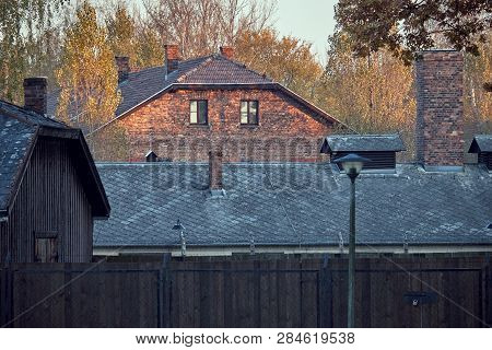 Fence With Electric Wires In Auschwitz Osventsim Concentration Camp - A Network Of German Nazi Conce