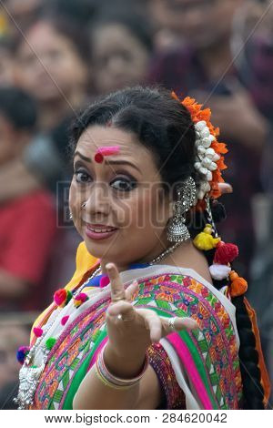 Kolkata , India - March 1, 2018: Expression Of Woman Dancer, Dressed In Traditional Indian Sari And 