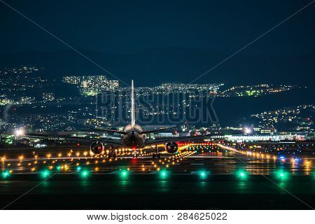 Jet Plane Taking Off Scene In The Night.
