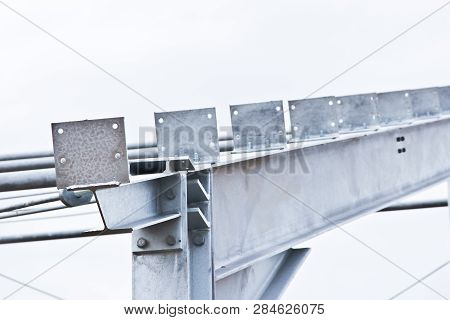 Part Of The Building Structure Of Galvanized Parts. Galvanized Parts On A Construction Site In Rainy