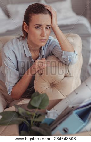 Downhearted Woman Looking At You With Desperation In Eyes