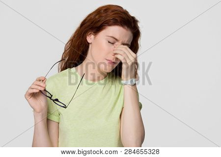 Stressed Upset Redhead Woman Feel Eyestrain Headache Take Off Glasses