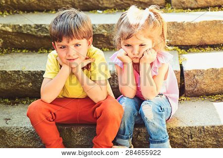 Childhood First Love. Summer Holiday And Vacation. Small Girl And Boy On Stairs. Relations. Couple O