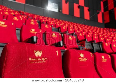 Russia, Nizhny Novgorod - November 14, 2016: Cinema Imperia Grez Nebo, Dolby Atmos. Empty Red Cinema