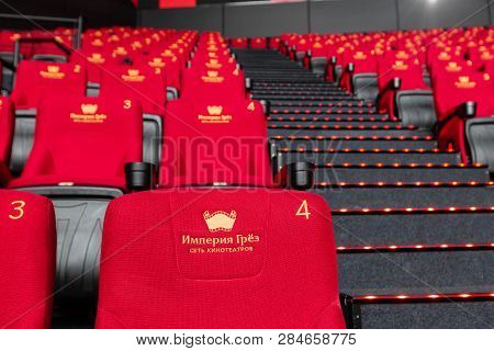 Russia, Nizhny Novgorod - November 14, 2016: Cinema Imperia Grez Nebo, Dolby Atmos. Empty Red Cinema