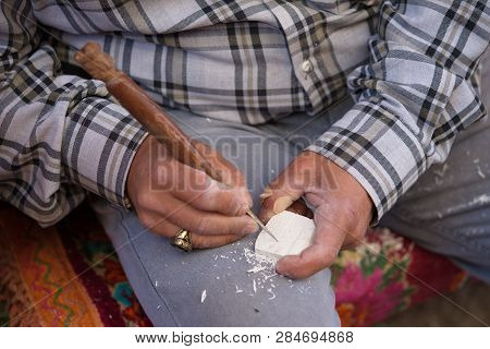 Meerschaum Carving Master. Shaping With Carving Knife. The Art Of Meerschaum Hand