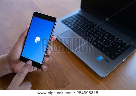 Chiang Mai, Thailand - April 21,2018: Man Holding Huawei With Paypal Apps On The Screen. Paypal Is A