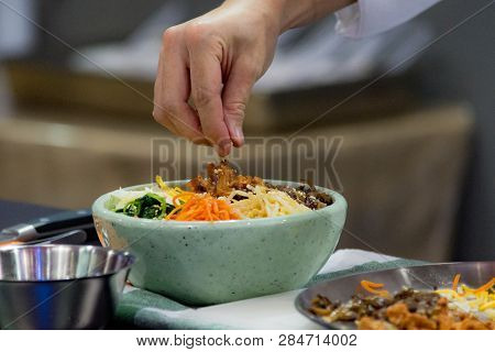 Bibimbap, Traditional Korean Cuisine Bibimbap, Chef Preparing Korean Food, Chef Cooking In Kitchen
