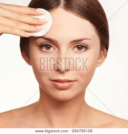 Home Face Care. Girl Remove Makeup. Woman Hand With Pad. Skin Clean With Cotton