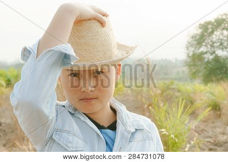 The Girl Wears A Hat In The Grass Desho Grass.