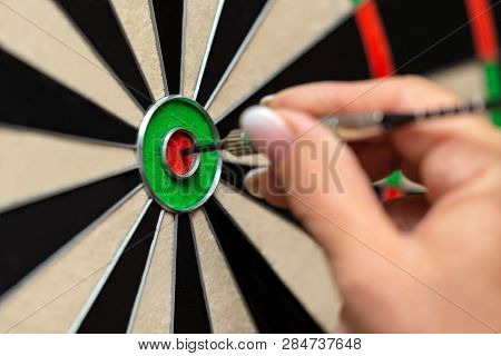 Closeup, Woman Playing Steeldart, Professional Dart Sport Trainee, Bullseye