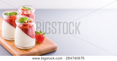 Delicous And Nutritious Double Color (colour) Strawberry Desserts With Mint And Diced Sarcocarp Topp