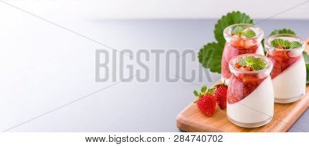 Delicous And Nutritious Double Color (colour) Strawberry Desserts With Mint And Diced Sarcocarp Topp