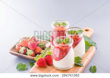 Delicous And Nutritious Double Color (colour) Strawberry Desserts With Mint And Diced Sarcocarp Topp