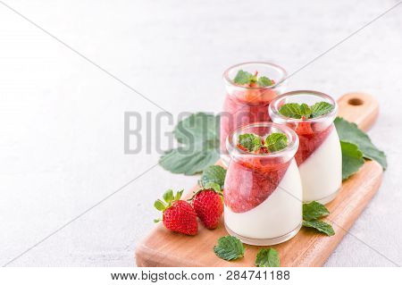 Delicous And Nutritious Double Color (colour) Strawberry Desserts With Mint And Diced Sarcocarp Topp