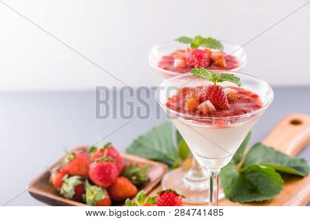 Delicous And Nutritious Double Color (colour) Strawberry Desserts With Mint And Diced Sarcocarp Topp