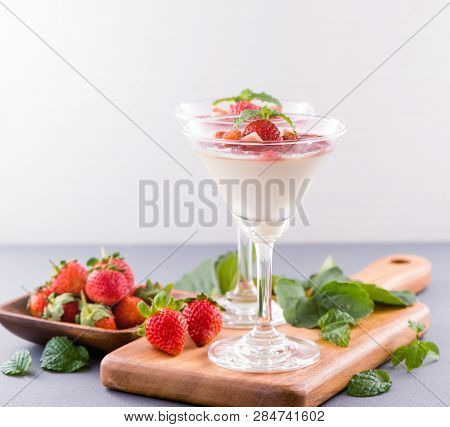 Delicous And Nutritious Double Color (colour) Strawberry Desserts With Mint And Diced Sarcocarp Topp
