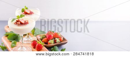 Delicous And Nutritious Double Color (colour) Strawberry Desserts With Mint And Diced Sarcocarp Topp