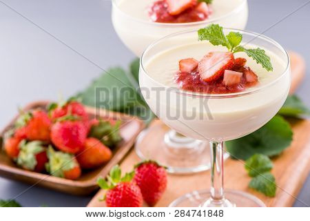 Delicous And Nutritious Double Color (colour) Strawberry Desserts With Mint And Diced Sarcocarp Topp