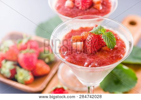 Delicous And Nutritious Double Color (colour) Strawberry Desserts With Mint And Diced Sarcocarp Topp