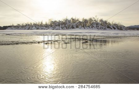 Beautiful Winter Landscape With A River And An Island