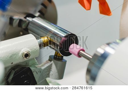 Intragrinding Machine During Operation. There Grinding Inner Sleeve Hole.