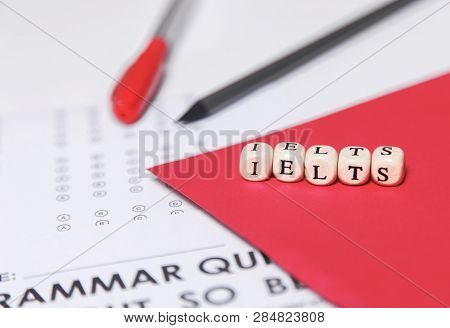 Test Of English Multiple Choice On Table. Top View, Flatlay, Free Space For Text