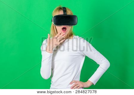 Woman Enjoying Cyber Fun Experience In Vr. Woman With Virtual Reality Headset. Cheerful Smiling Woma